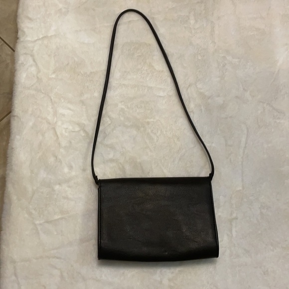 H & M black crossbody with bold gold chain front accent. - Picture 3 of 11